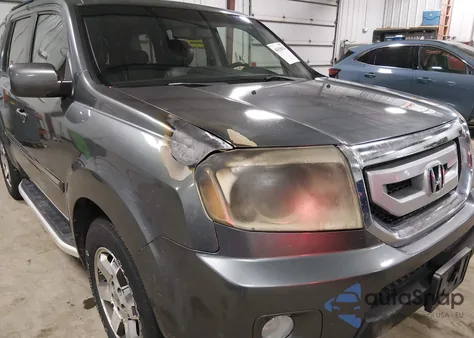 2010 Honda Pilot Touring z USA, uszkodzony, nr VIN 5FNYF4H99AB024599